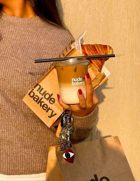 iced coffee, iced latte, buttery croissant, fresh pastry, bakery items, cold coffee drink, bestseller push, lifestyle, warm, neutral, brown
